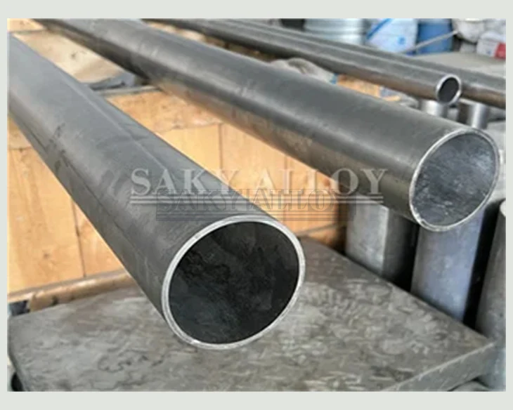 Two large-diameter titanium pipes with open ends