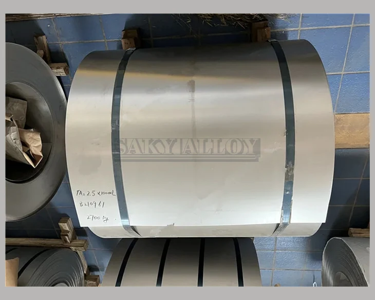Wide titanium coil secured with steel bands