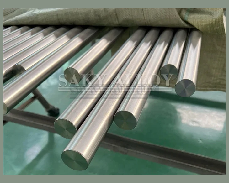 Bright-finished titanium round bars arranged on a worktable